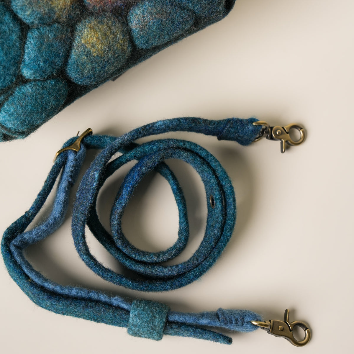 Pebbles Saddle Bag, handmade wet-felted wool, studio photo 3