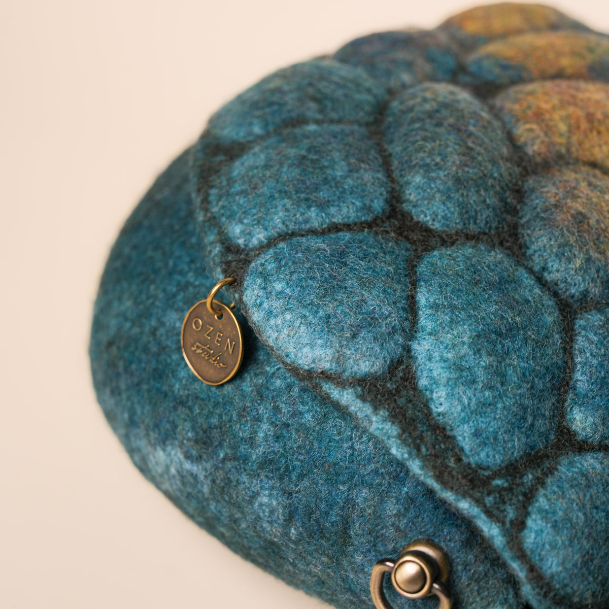 Pebbles Saddle Bag, handmade wet-felted wool, studio photo 4