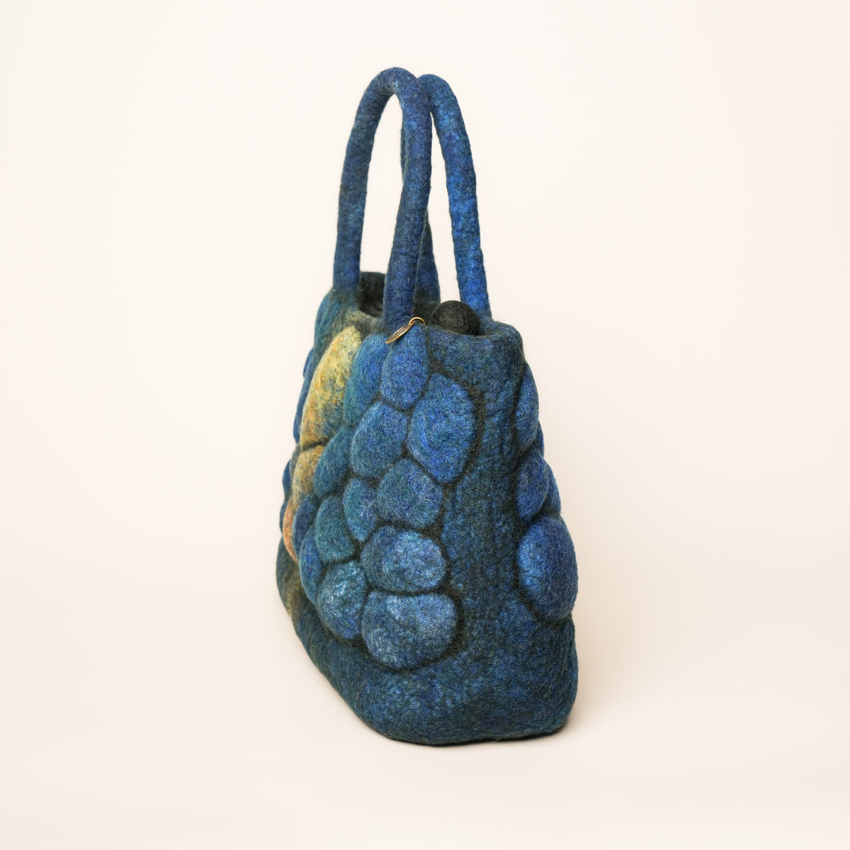 Pebbles Studio Bag, handmade wet-felted wool, studio photo 3
