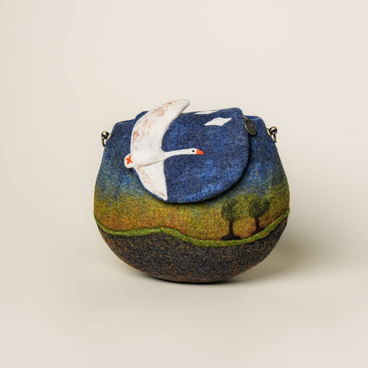 Heron Saddle Bag, handmade wet-felted wool, studio photo 1