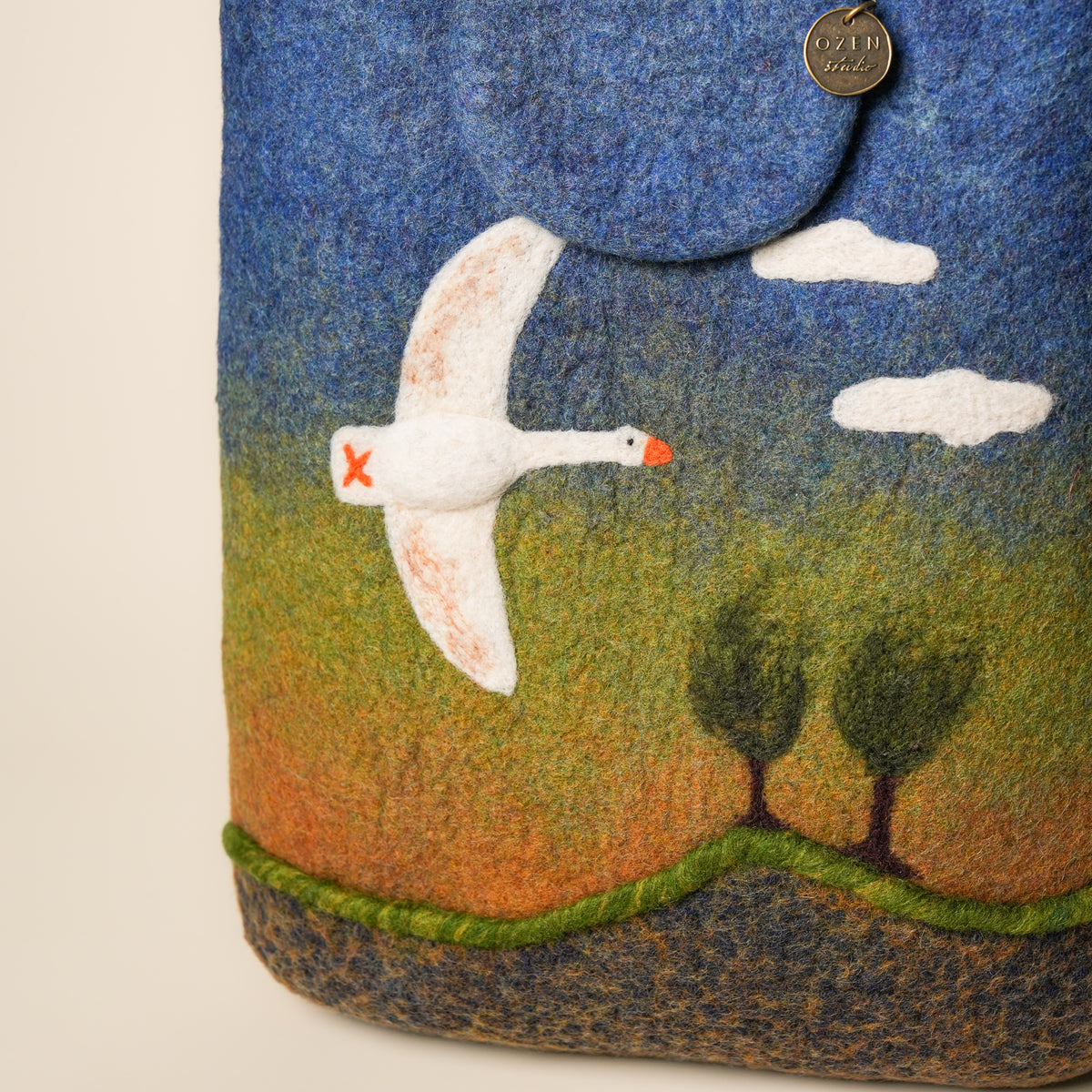 Heron Shopper, handmade wet-felted wool, studio photo 3