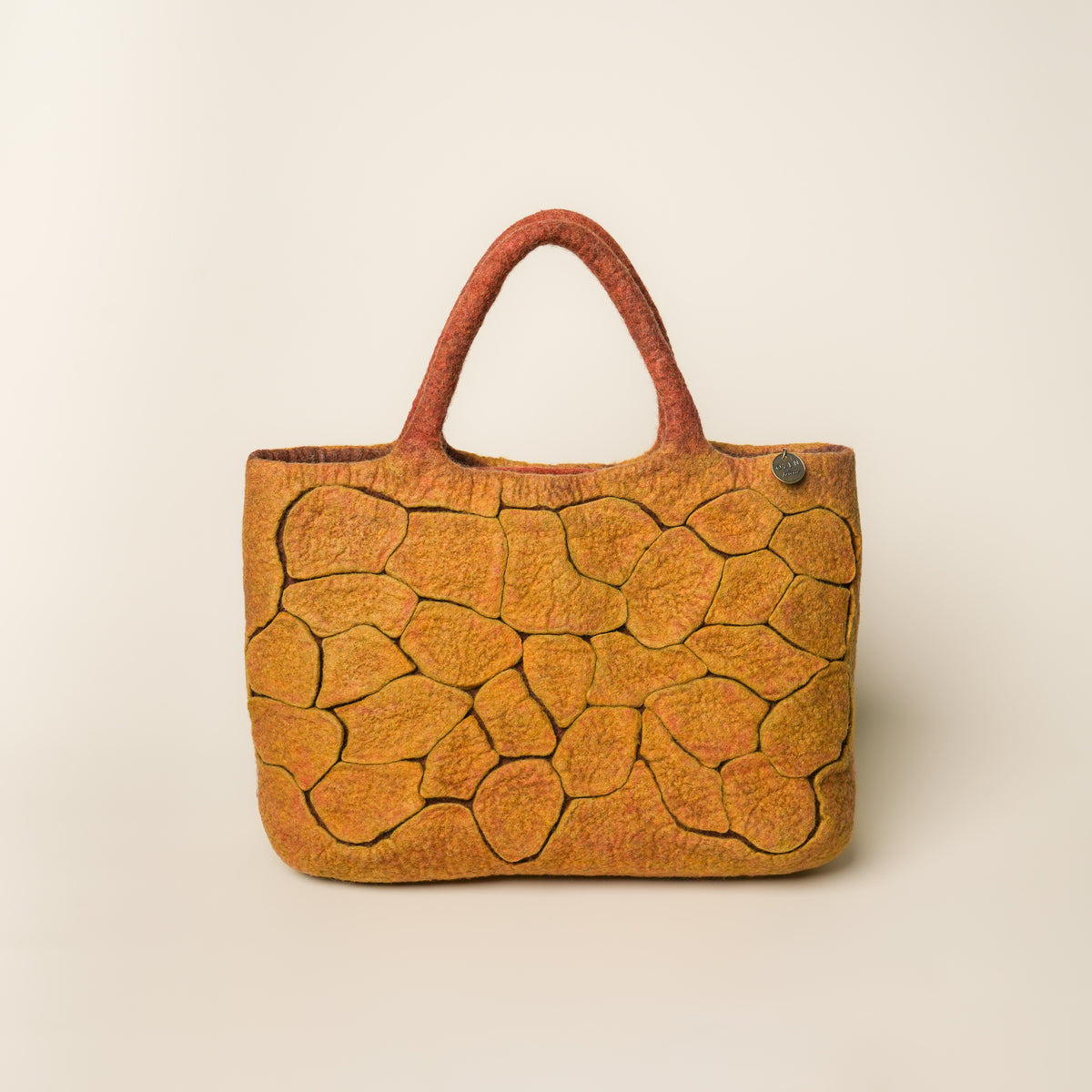 Mosaic Amber Studio Bag, handmade wet-felted wool, studio photo 1