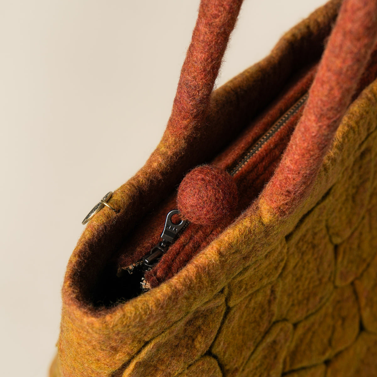 Mosaic Amber Studio Bag, handmade wet-felted wool, studio photo 4
