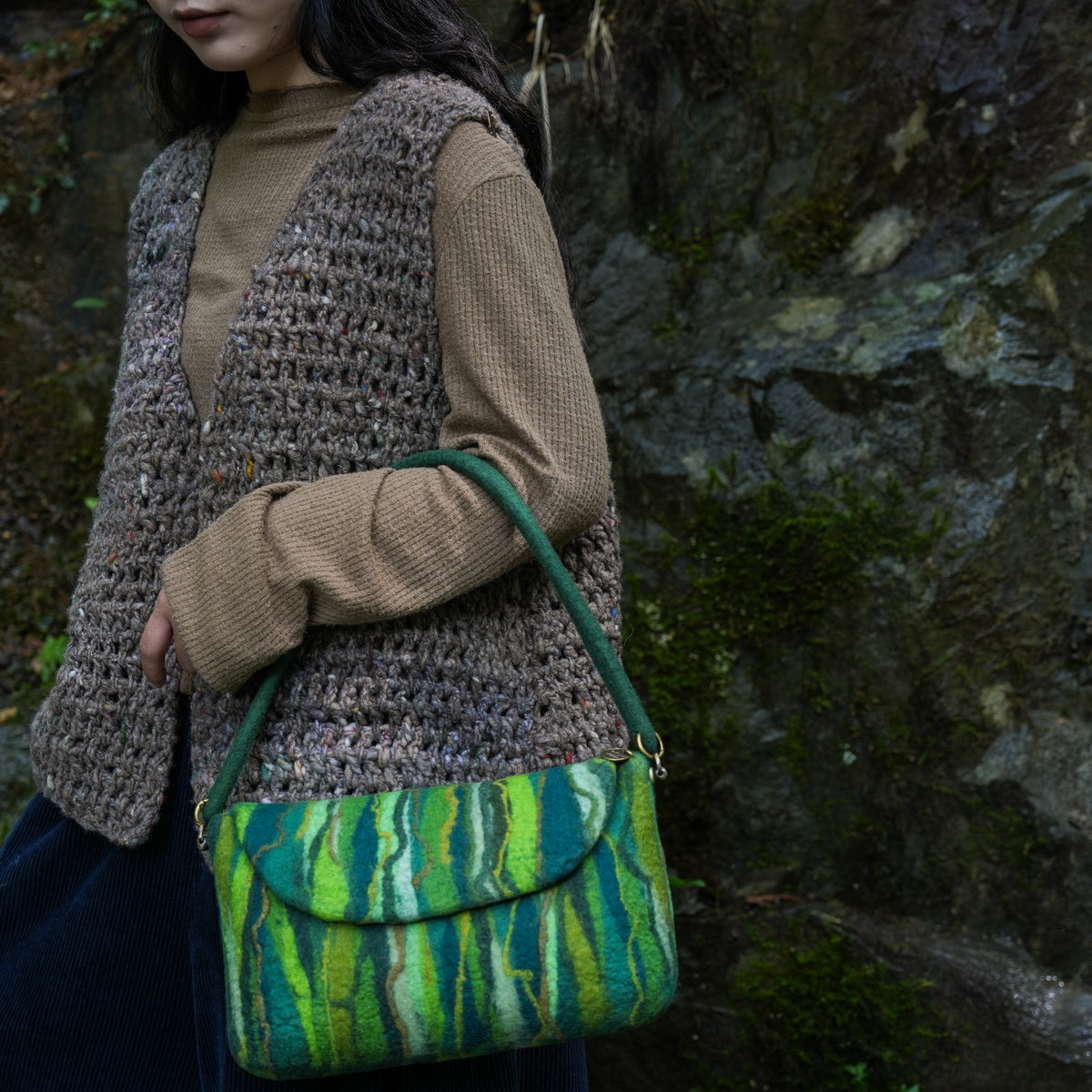 Evergreen Baguette Bag, handmade wet-felted wool, lifestyle photo 1