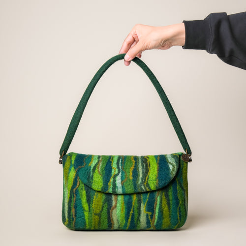 Evergreen Baguette Bag, handmade wet-felted wool, studio photo 1