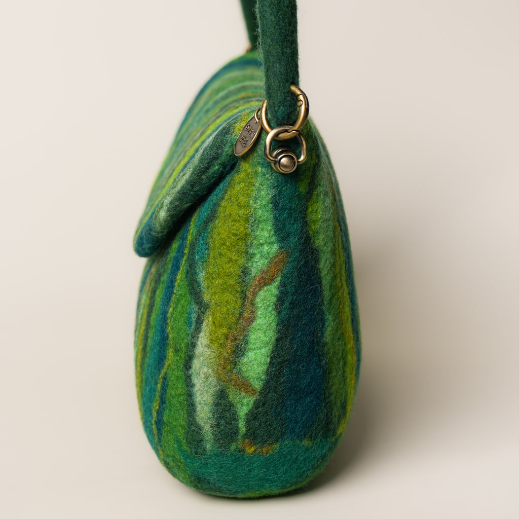 Evergreen Baguette Bag, handmade wet-felted wool, studio photo 4