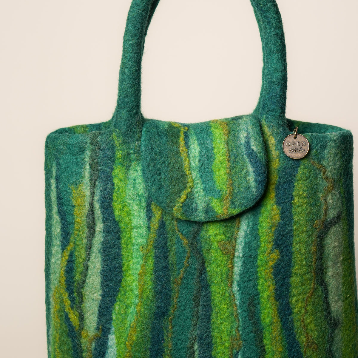 Evergreen Shopper, handmade wet-felted wool, studio photo 1