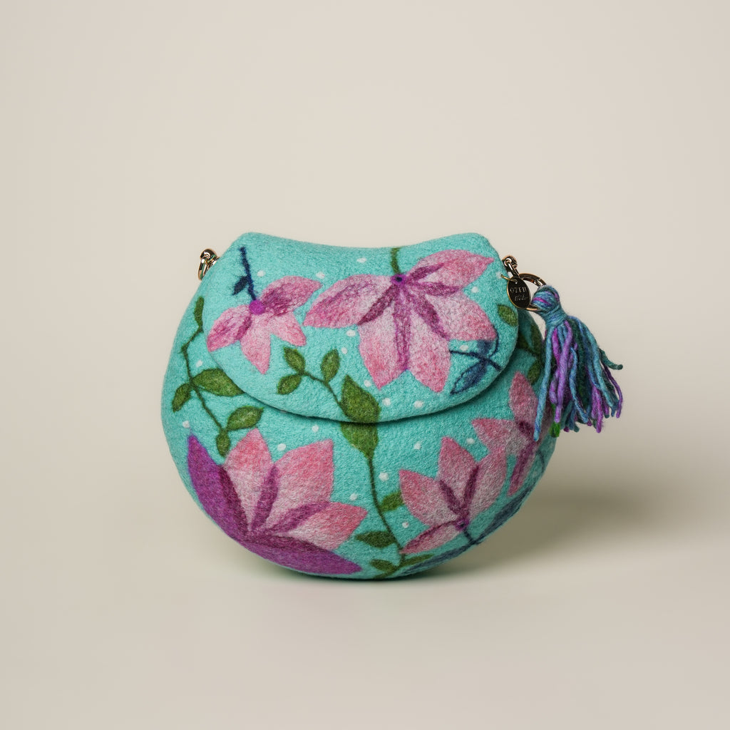 Lotus Saddle Bag by Frida Åberg, handmade wet-felted wool, studio photo 1
