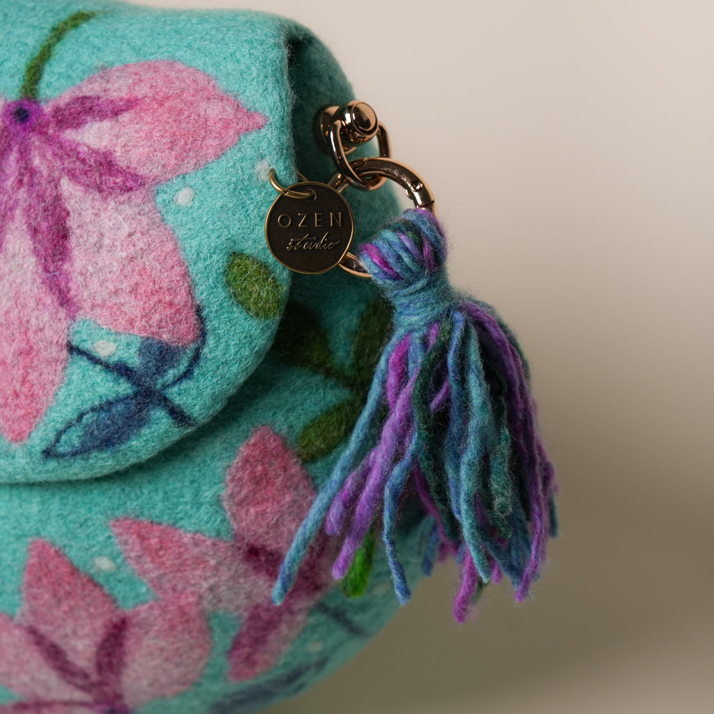 Lotus Saddle Bag by Frida Åberg, handmade wet-felted wool, studio photo 2
