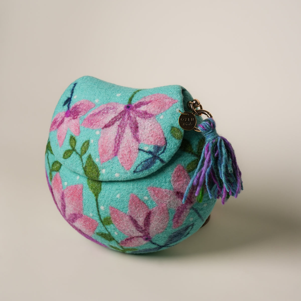 Lotus Saddle Bag by Frida Åberg, handmade wet-felted wool, studio photo 3