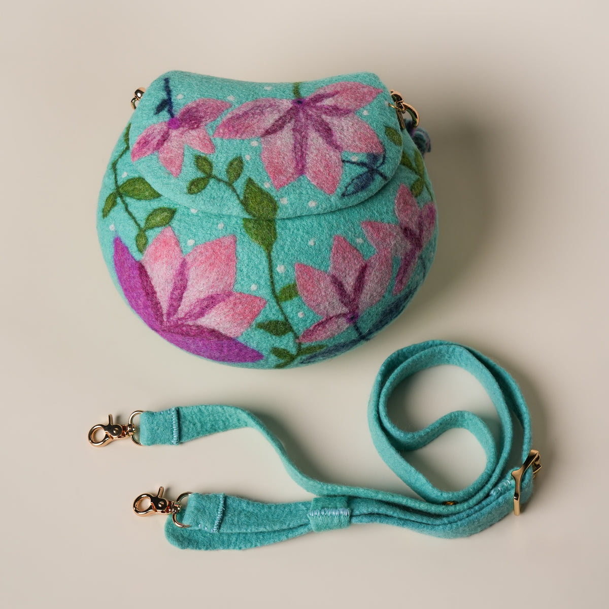 Lotus Saddle Bag by Frida Åberg, handmade wet-felted wool, studio photo 5